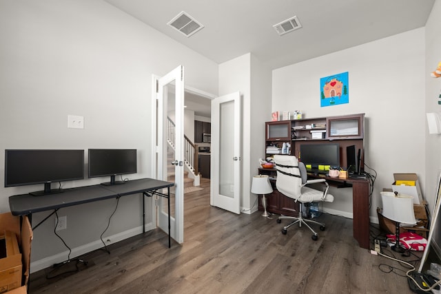 office featuring dark hardwood / wood-style flooring and french doors