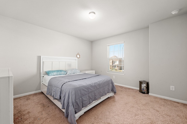 bedroom featuring carpet