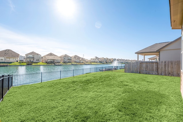 view of yard with a water view