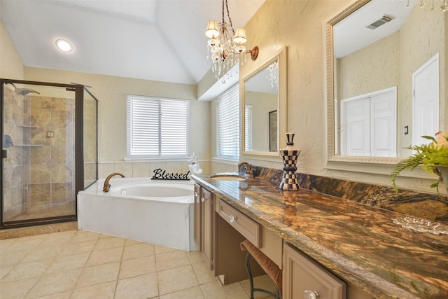 bathroom featuring tile patterned flooring, lofted ceiling, plus walk in shower, and an inviting chandelier