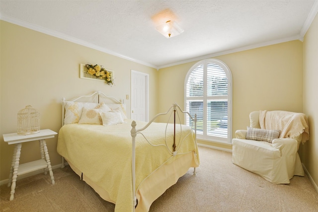 carpeted bedroom with a textured ceiling and ornamental molding