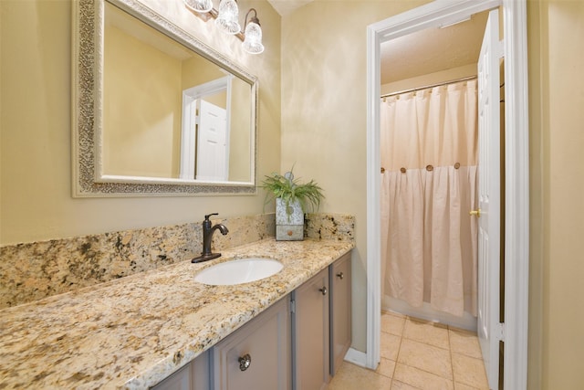 bathroom with vanity and tile patterned floors