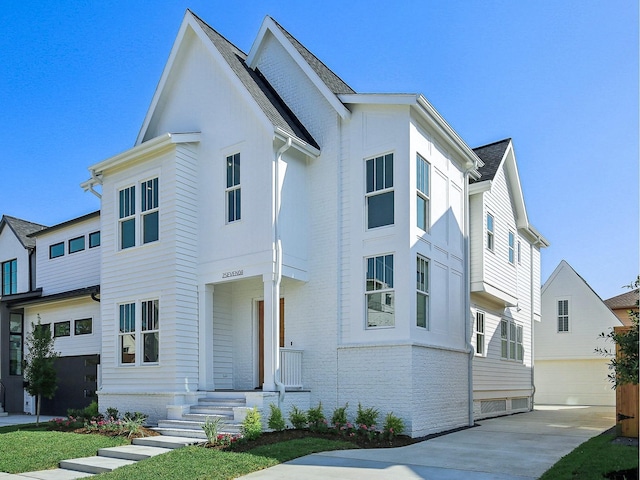 view of front of home with a garage