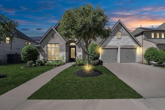 french provincial home with a yard