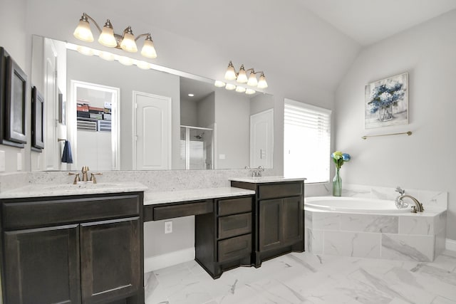 bathroom featuring vanity, independent shower and bath, and vaulted ceiling