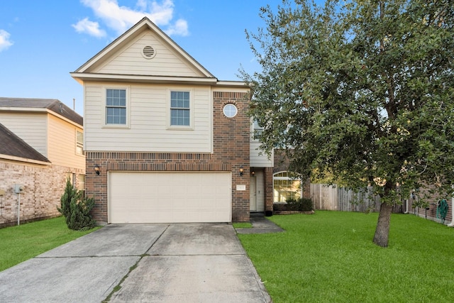 view of front of home with a front yard and a garage