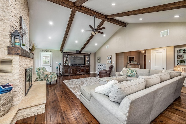 living room featuring high vaulted ceiling, ceiling fan, a fireplace, beam ceiling, and dark hardwood / wood-style flooring