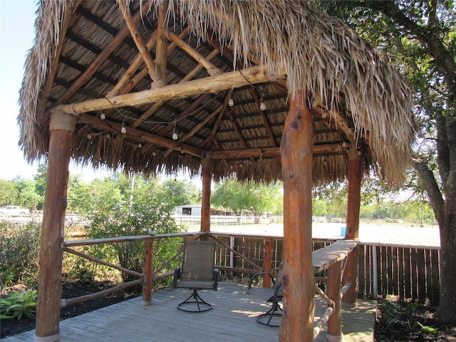 wooden terrace with a gazebo