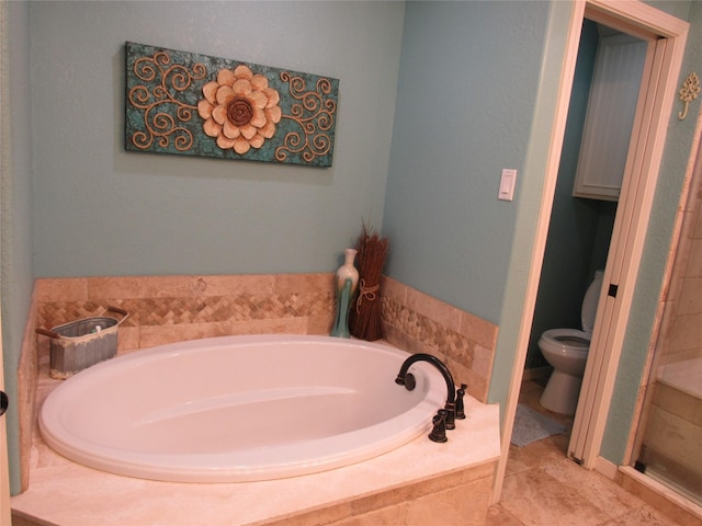 bathroom with shower with separate bathtub and toilet