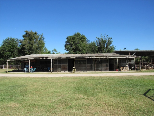 exterior space featuring an outbuilding