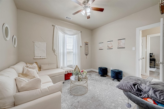 living room featuring ceiling fan