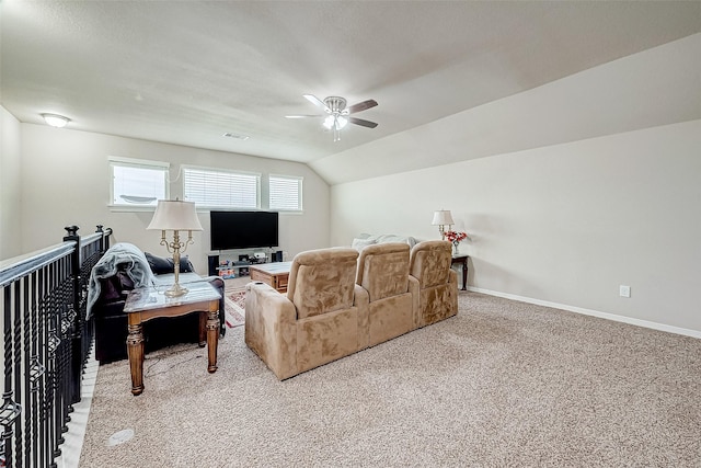 living room with lofted ceiling, visible vents, light carpet, ceiling fan, and baseboards