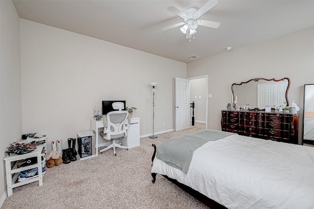 bedroom with ceiling fan, carpet floors, visible vents, and baseboards