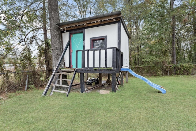 view of playground with a yard