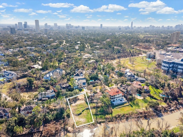 24 Tiel Way, Houston, TX 77019 - aerial overview of property's location featuring property boundaries highlighted and city skyline
