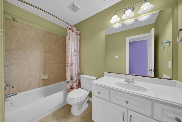 full bathroom with tile patterned floors, a textured ceiling, toilet, vanity, and shower / tub combo