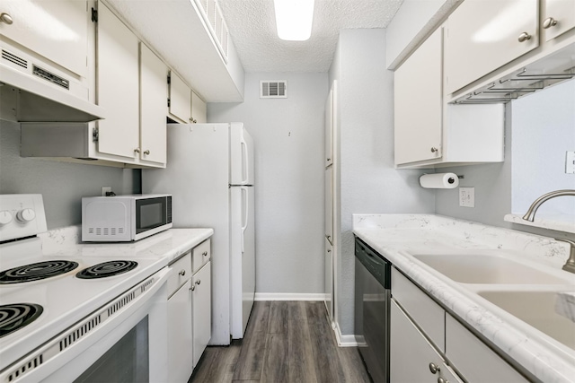 kitchen featuring a textured ceiling, white appliances, ventilation hood, sink, and white cabinetry