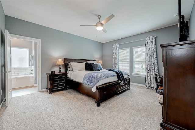 bedroom featuring ceiling fan and light colored carpet