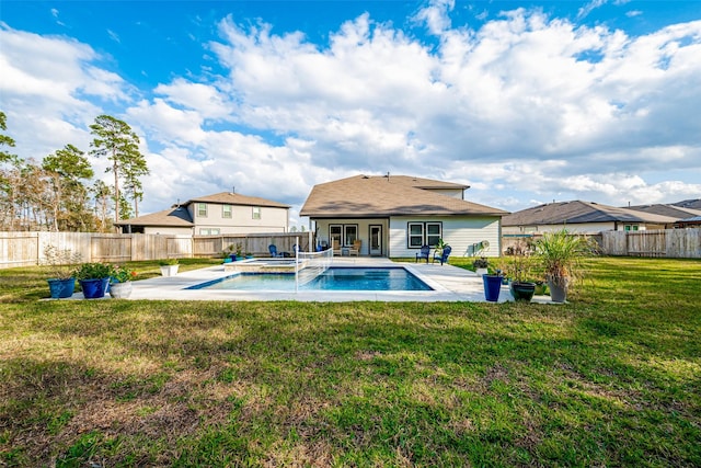 view of pool featuring a patio and a yard