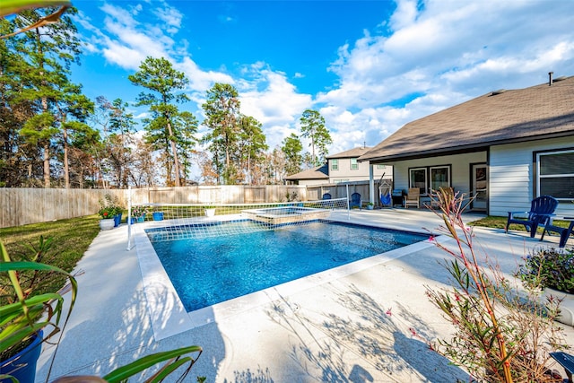 view of swimming pool with an in ground hot tub and a patio