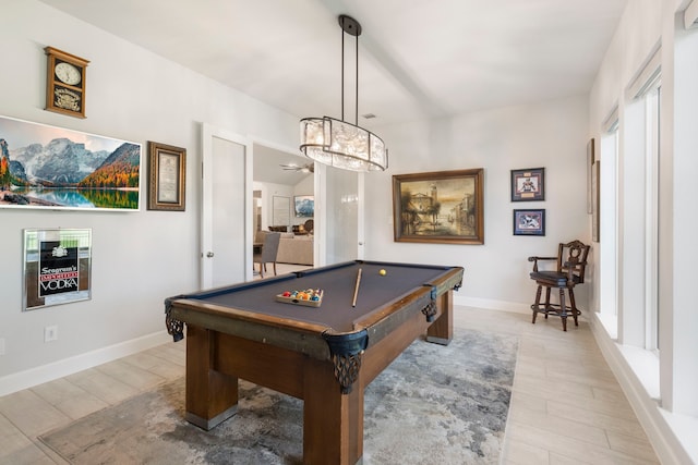 recreation room with light hardwood / wood-style floors, ceiling fan, and pool table