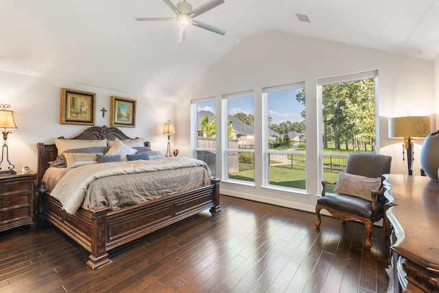 bedroom with multiple windows, ceiling fan, and dark wood-type flooring