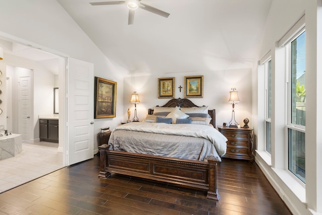 bedroom with ceiling fan, ensuite bathroom, and high vaulted ceiling