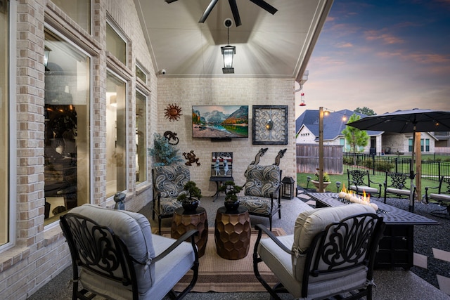 view of patio with outdoor lounge area and ceiling fan