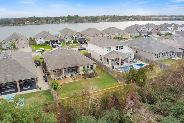 bird's eye view with a water view