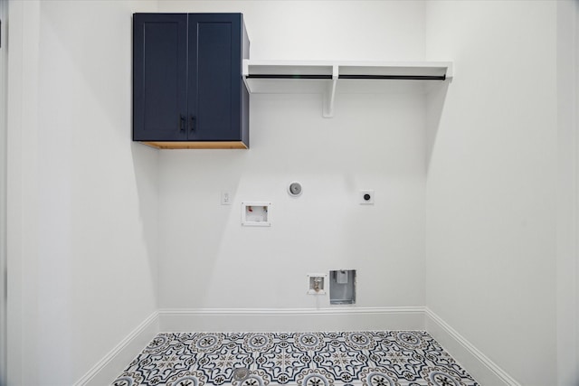 washroom with electric dryer hookup, gas dryer hookup, cabinets, washer hookup, and tile patterned flooring