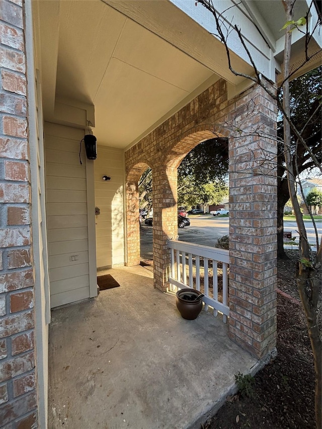 view of patio featuring a porch