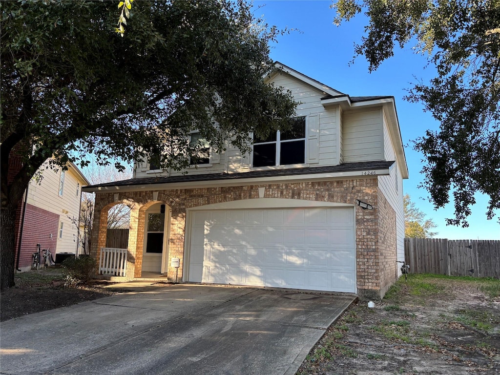 view of front of property featuring a garage