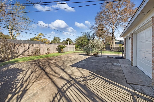 view of patio / terrace with a garage