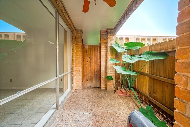 balcony featuring ceiling fan