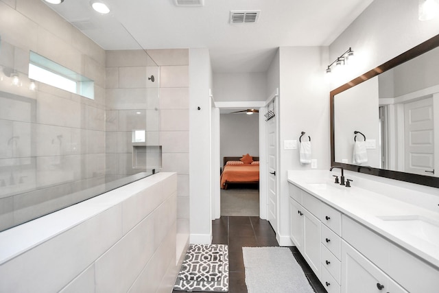 bathroom with vanity and ceiling fan