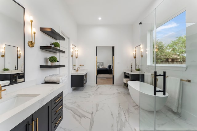 bathroom with vanity and a bathtub