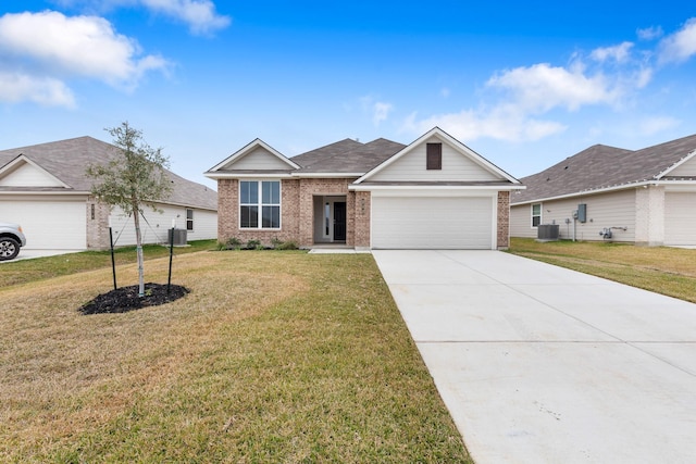 ranch-style house with a garage, central AC, and a front lawn