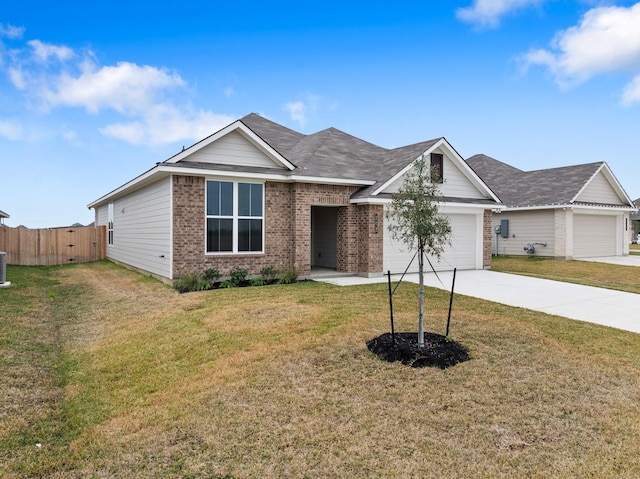 view of front facade with a front yard, a garage, and central AC