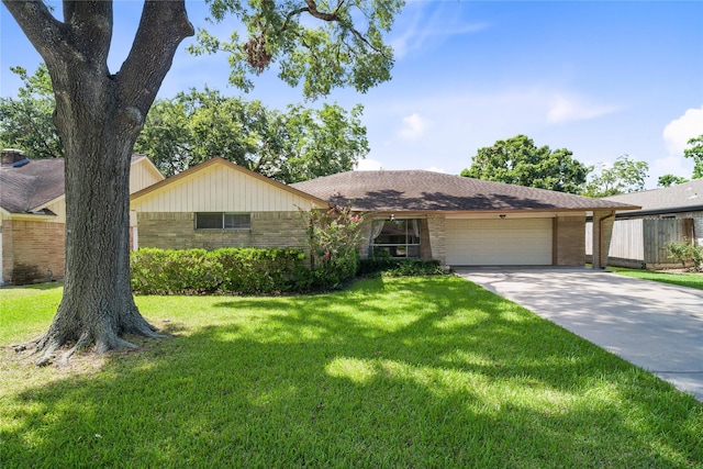 ranch-style home featuring a front yard and a garage