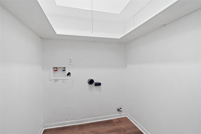 laundry area featuring hookup for a washing machine, dark hardwood / wood-style floors, and hookup for a gas dryer