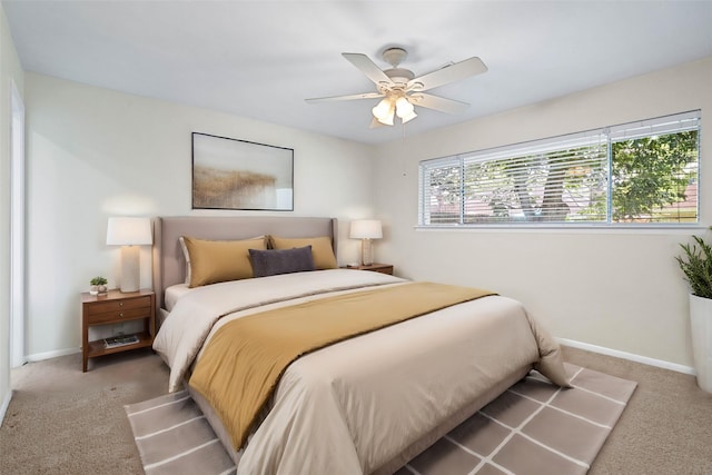 bedroom featuring ceiling fan and carpet floors