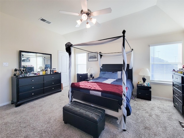 bedroom featuring lofted ceiling, carpet floors, and ceiling fan