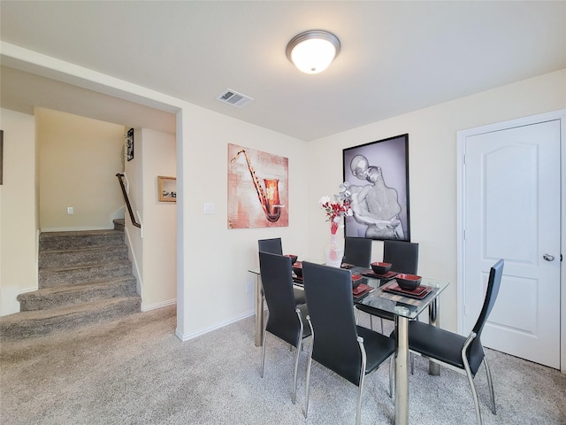 dining room with carpet flooring