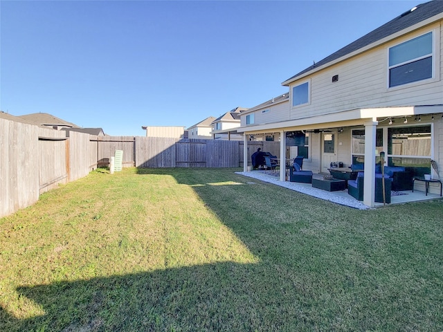 view of yard featuring a patio area and an outdoor living space