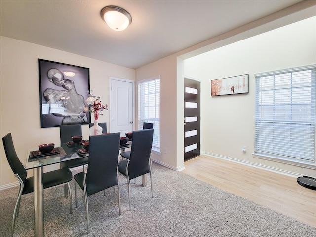 dining room with light hardwood / wood-style flooring