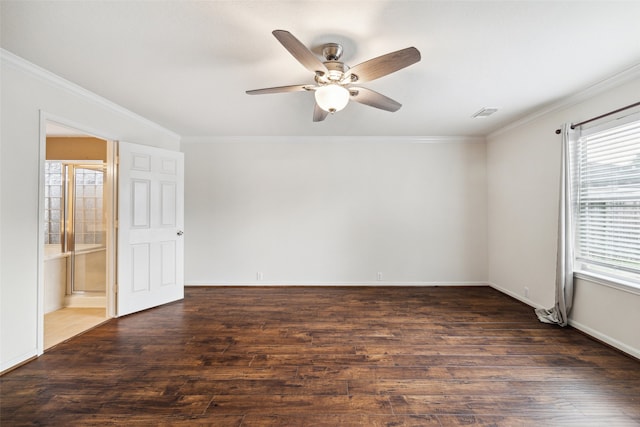 empty room featuring crown molding, ceiling fan, and dark hardwood / wood-style floors