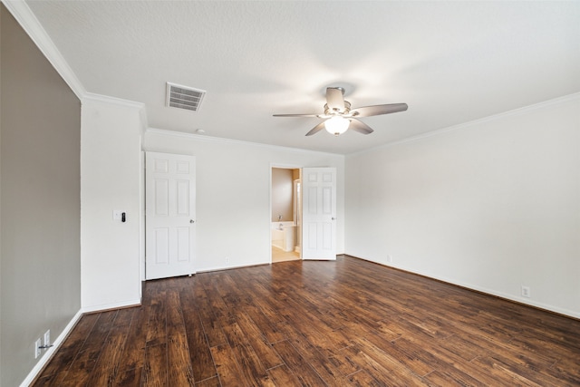 empty room featuring dark hardwood / wood-style floors, ceiling fan, and ornamental molding