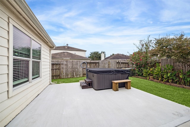 view of patio featuring a hot tub