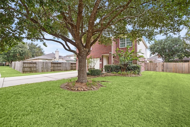 view of front of home with a front lawn