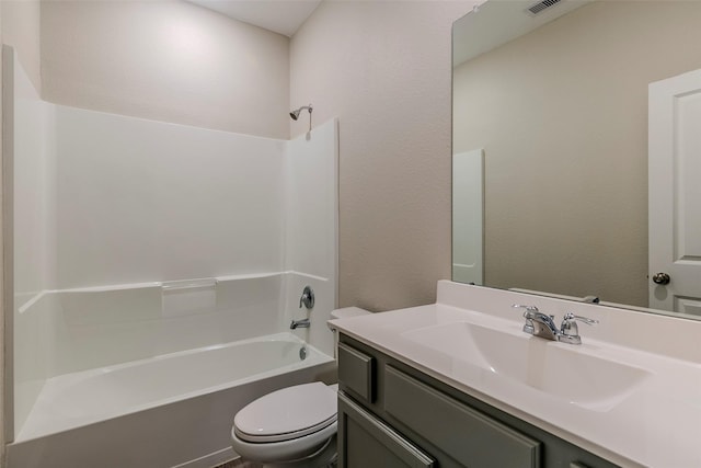 full bathroom with toilet, vanity, and bathing tub / shower combination